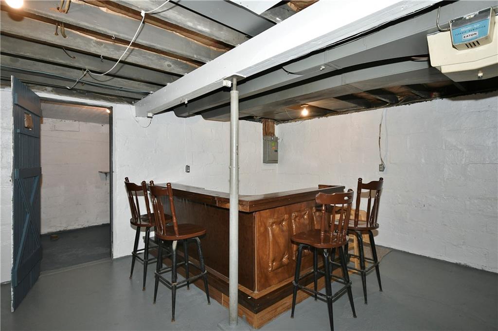 335 Mercer Street Turtle Creek, PA 15145 - Photo 20 of 25 a view of a dining room with furniture and a table