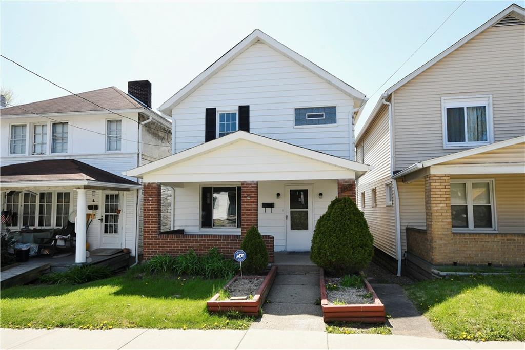 335 Mercer Street Turtle Creek, PA 15145 - Photo 24 of 25 a front view of a house with a yard