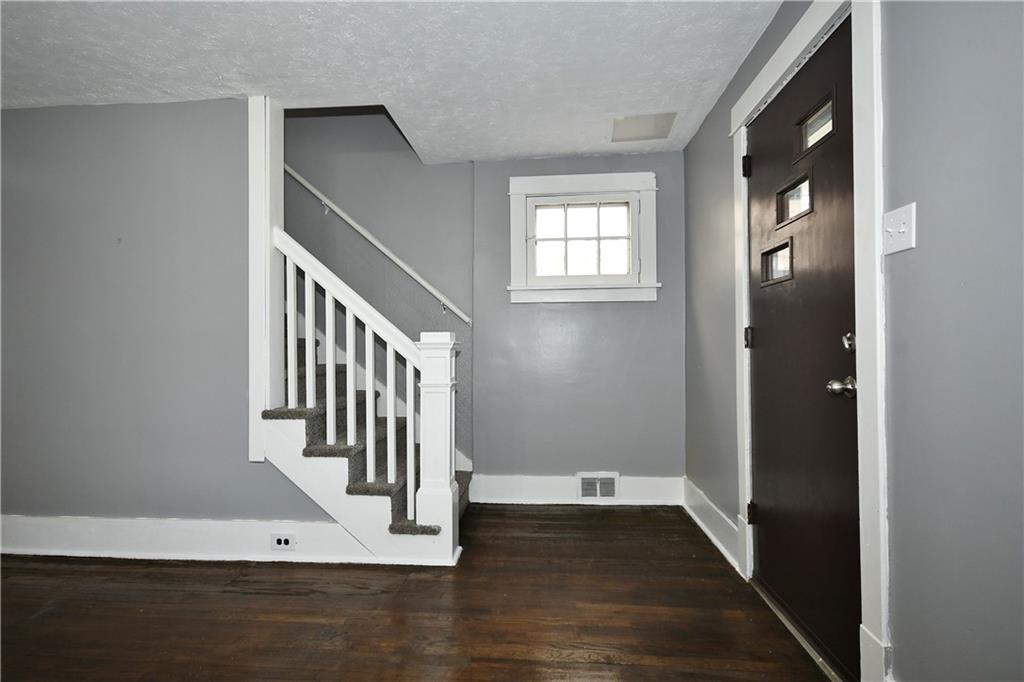 335 Mercer Street Turtle Creek, PA 15145 - Photo 3 of 25 a view of an entryway with wooden floor