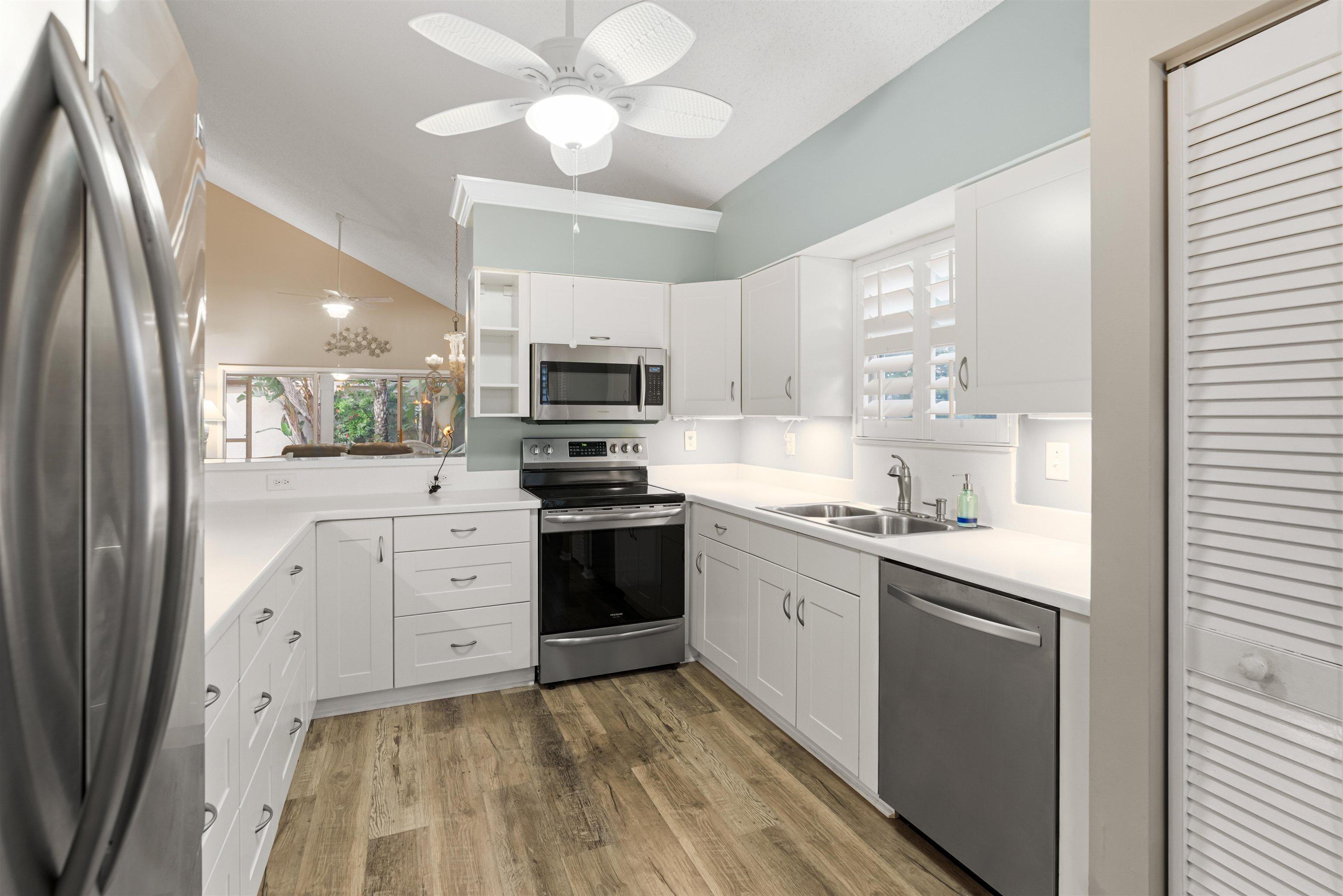 362 Monika Place St. Augustine, FL 32080 - Photo 5 of 44 a kitchen with stainless steel appliances a sink stove and refrigerator