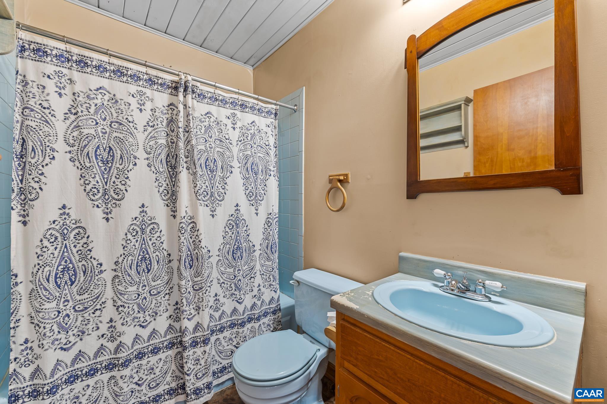 987 Matthew Mill Road Ruckersville, VA 22968 - Photo 23 of 63 a bathroom with a granite countertop sink mirror vanity and toilet