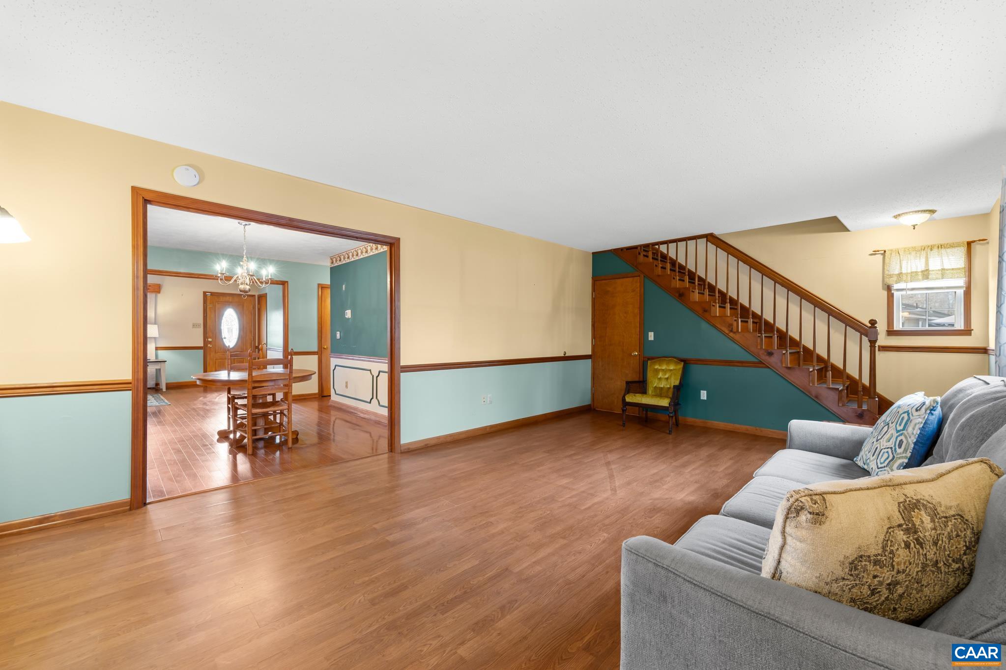 987 Matthew Mill Road Ruckersville, VA 22968 - Photo 26 of 63 a living room with furniture and wooden floor