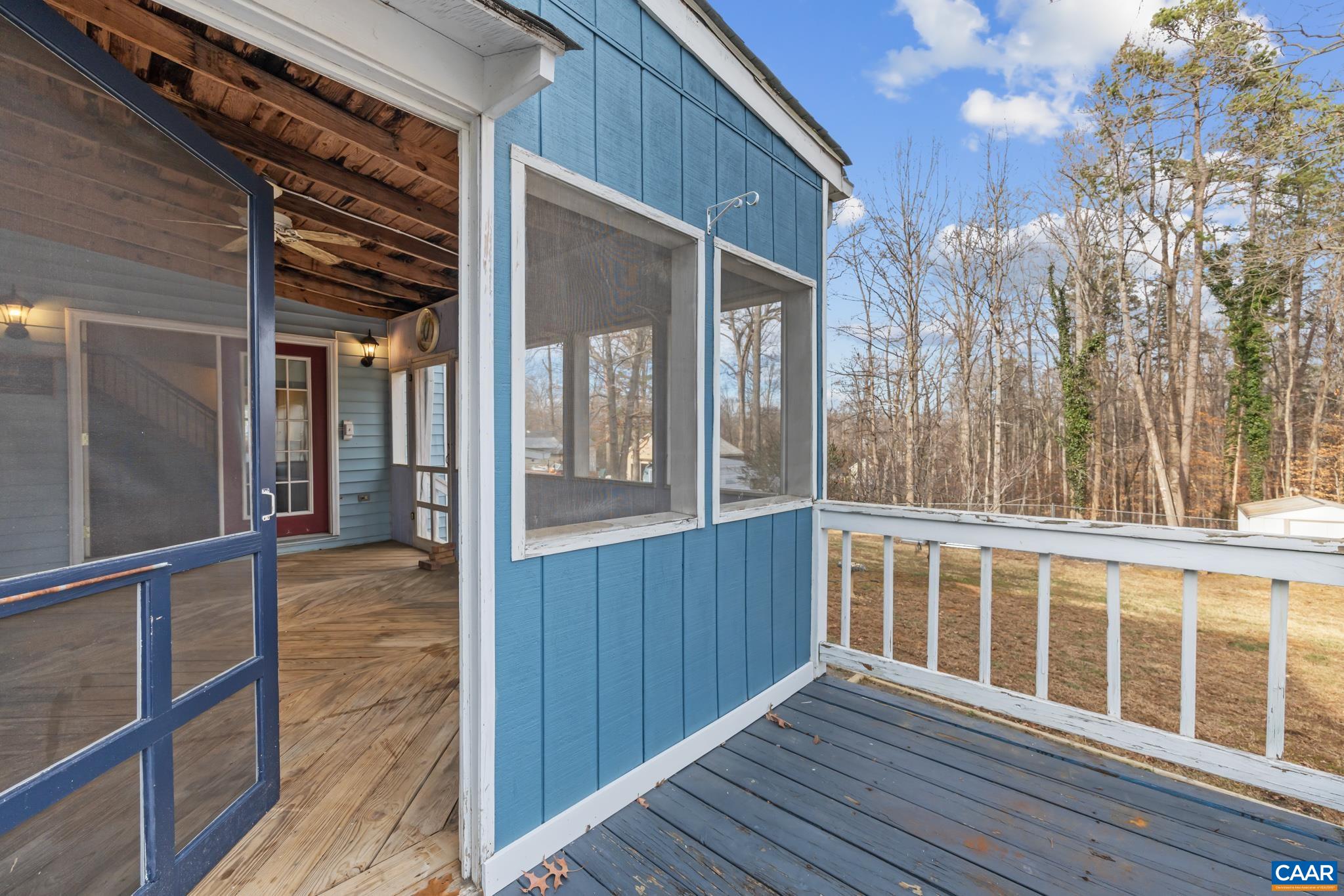 987 Matthew Mill Road Ruckersville, VA 22968 - Photo 29 of 63 a view of a house with a balcony