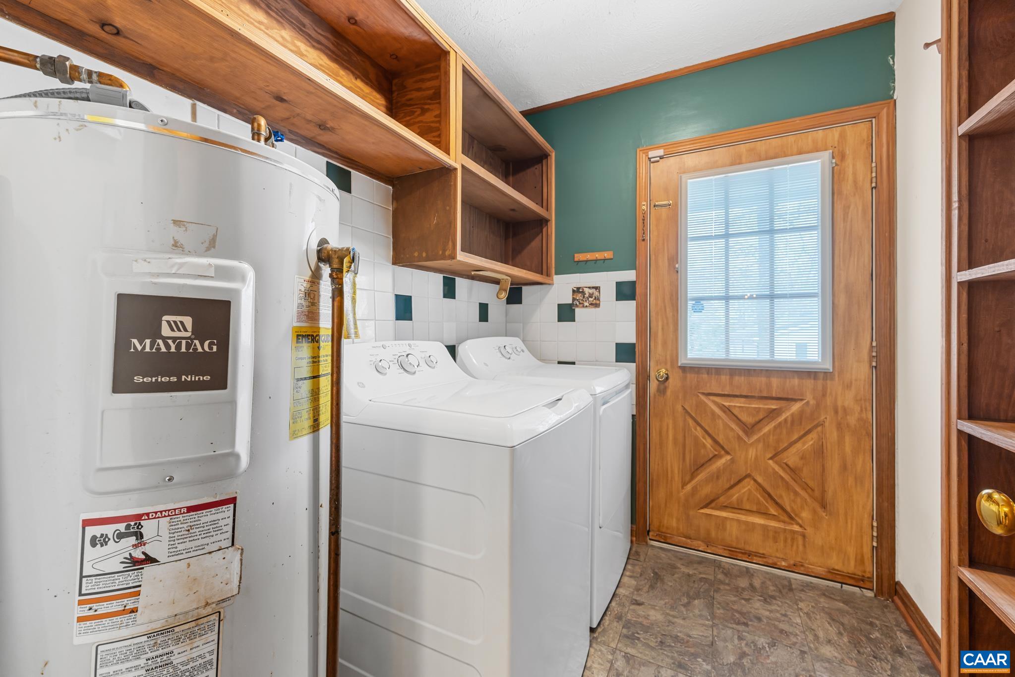 987 Matthew Mill Road Ruckersville, VA 22968 - Photo 30 of 63 a utility room with dryer and washer