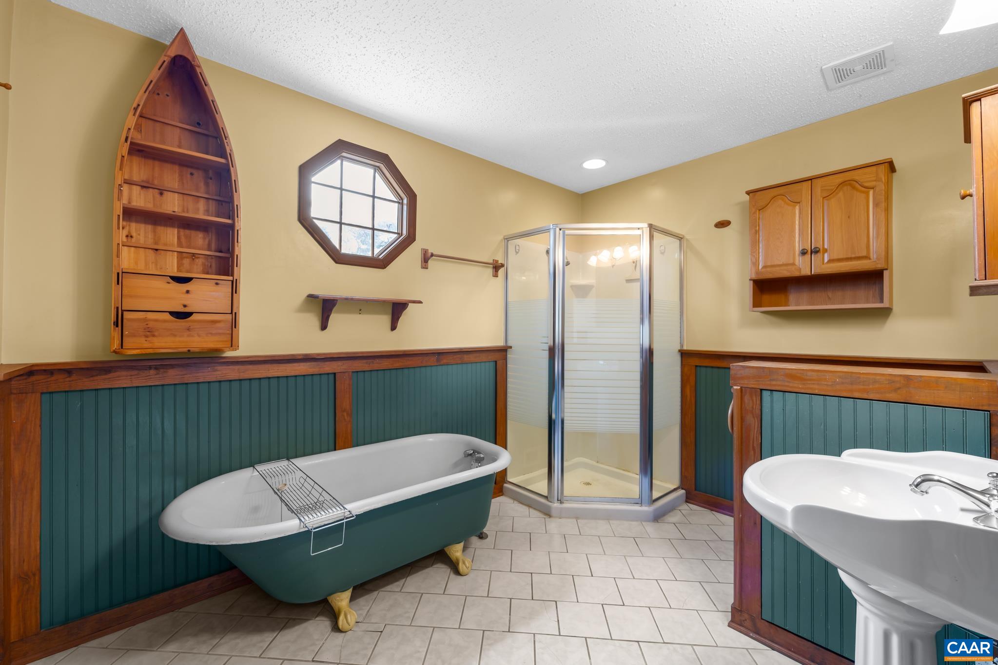 987 Matthew Mill Road Ruckersville, VA 22968 - Photo 35 of 63 a bathroom with a toilet a sink and a mirror