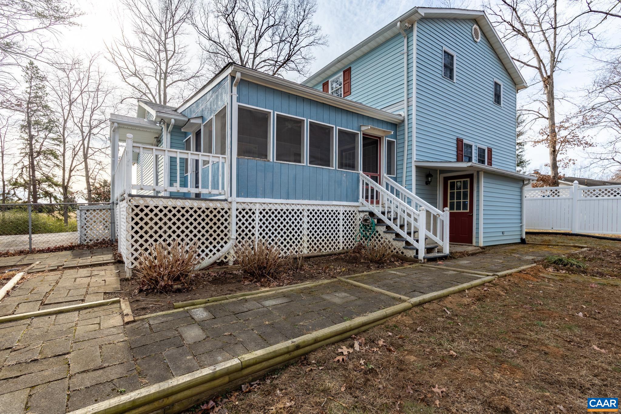 987 Matthew Mill Road Ruckersville, VA 22968 - Photo 45 of 63 a view of a house with a yard