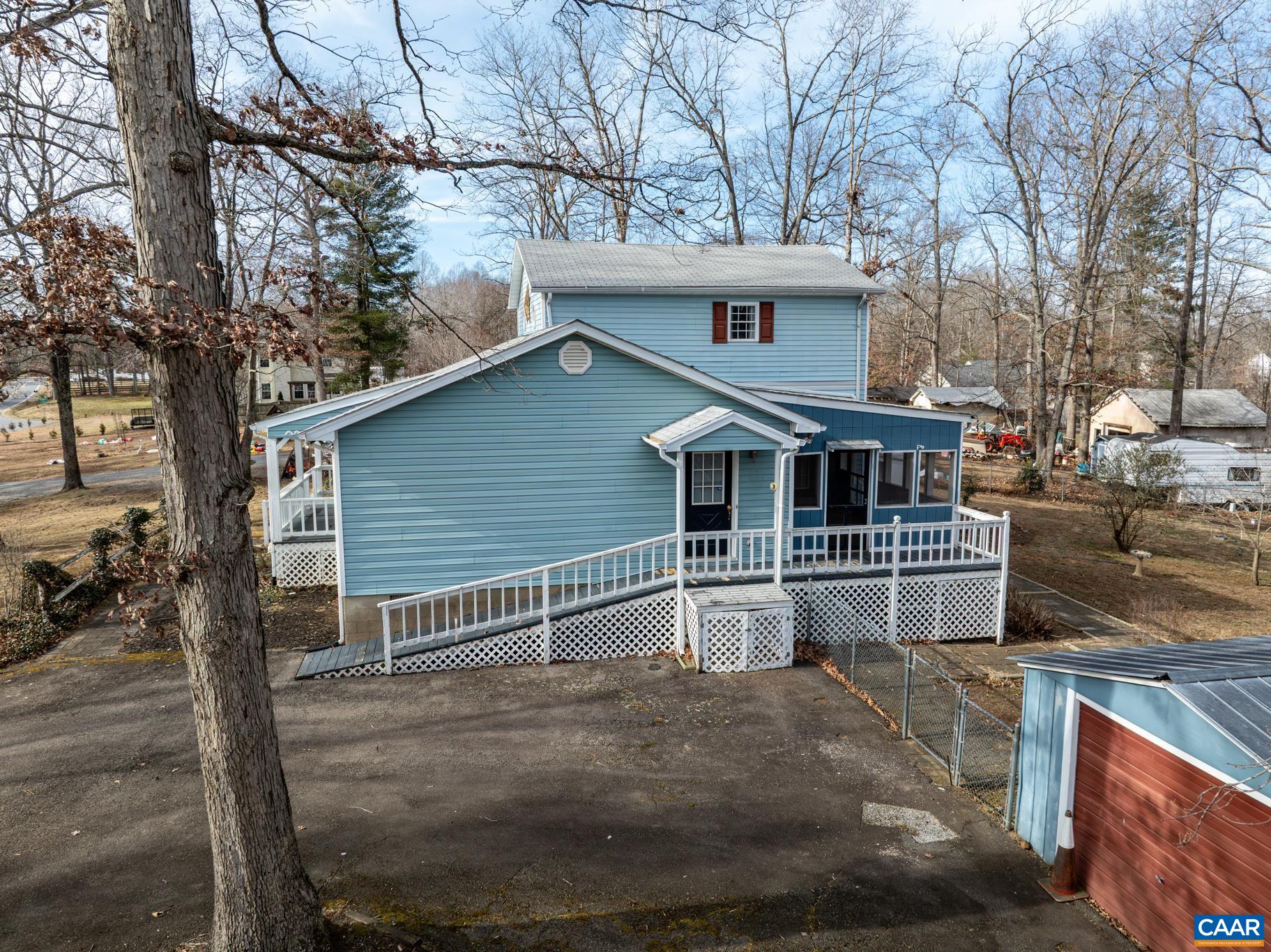 987 Matthew Mill Road Ruckersville, VA 22968 - Photo 47 of 63 a view of house with a yard