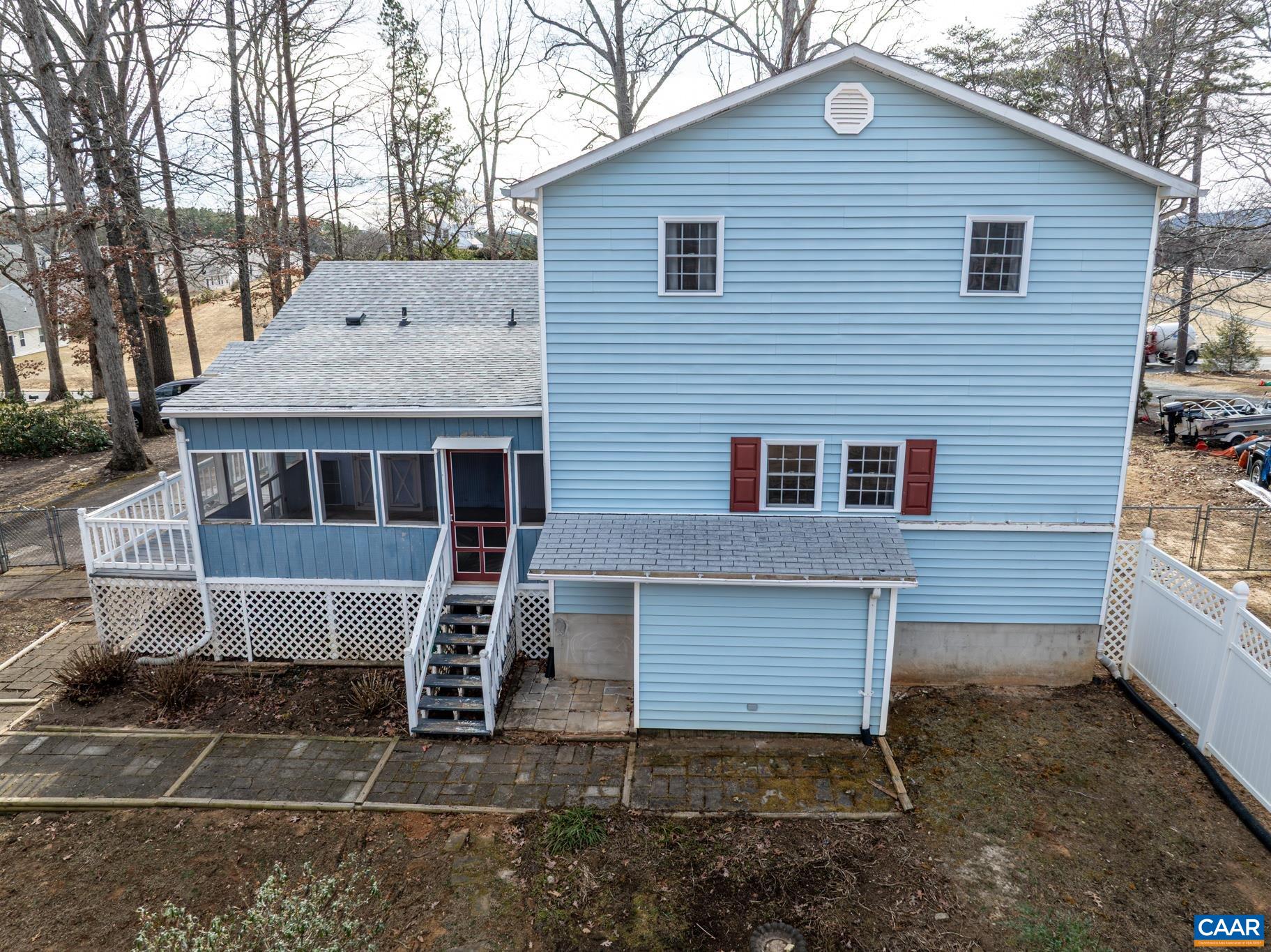 987 Matthew Mill Road Ruckersville, VA 22968 - Photo 48 of 63 a front view of a house with a yard