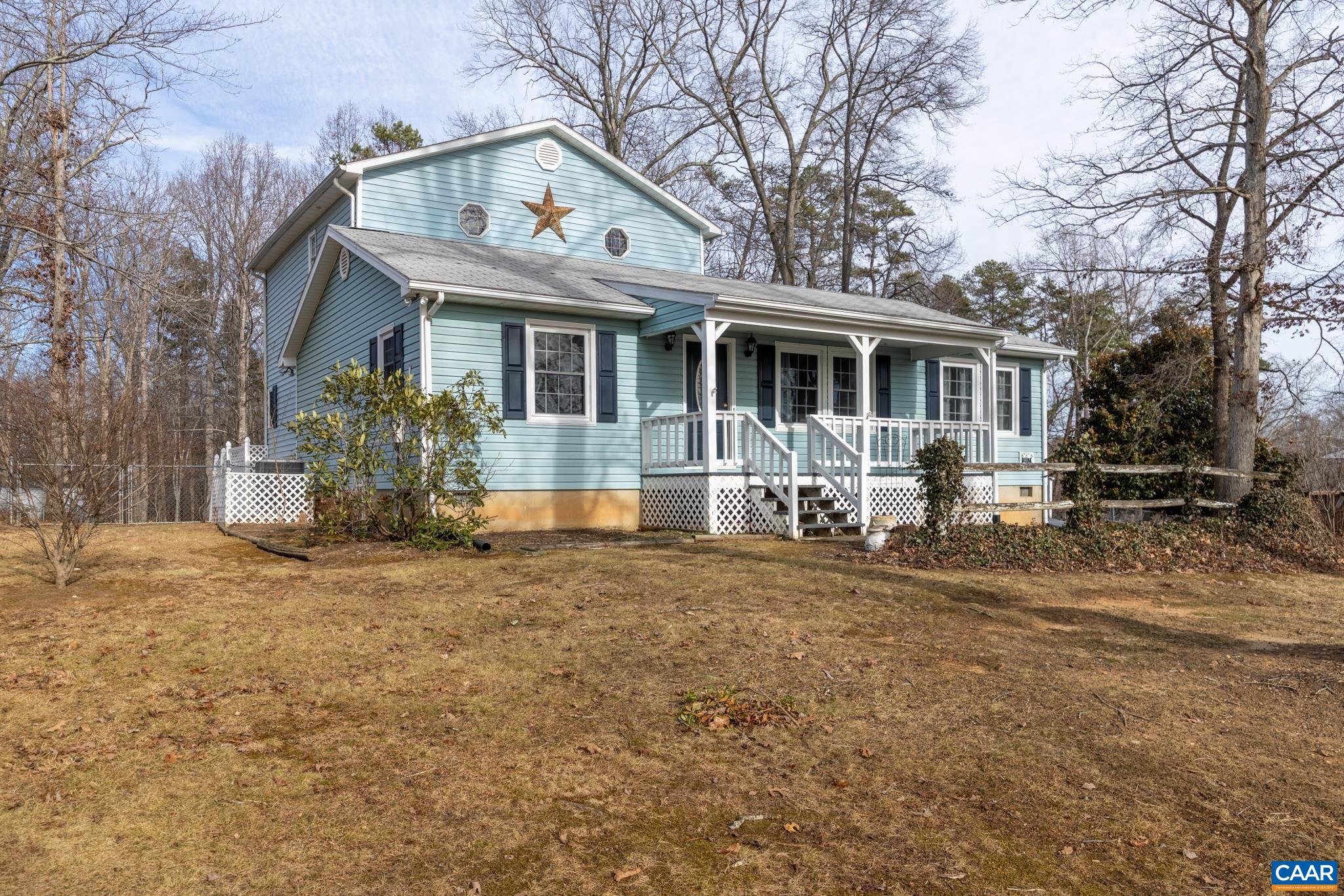 987 Matthew Mill Road Ruckersville, VA 22968 - Photo 50 of 63 a front view of house with yard porch and furniture