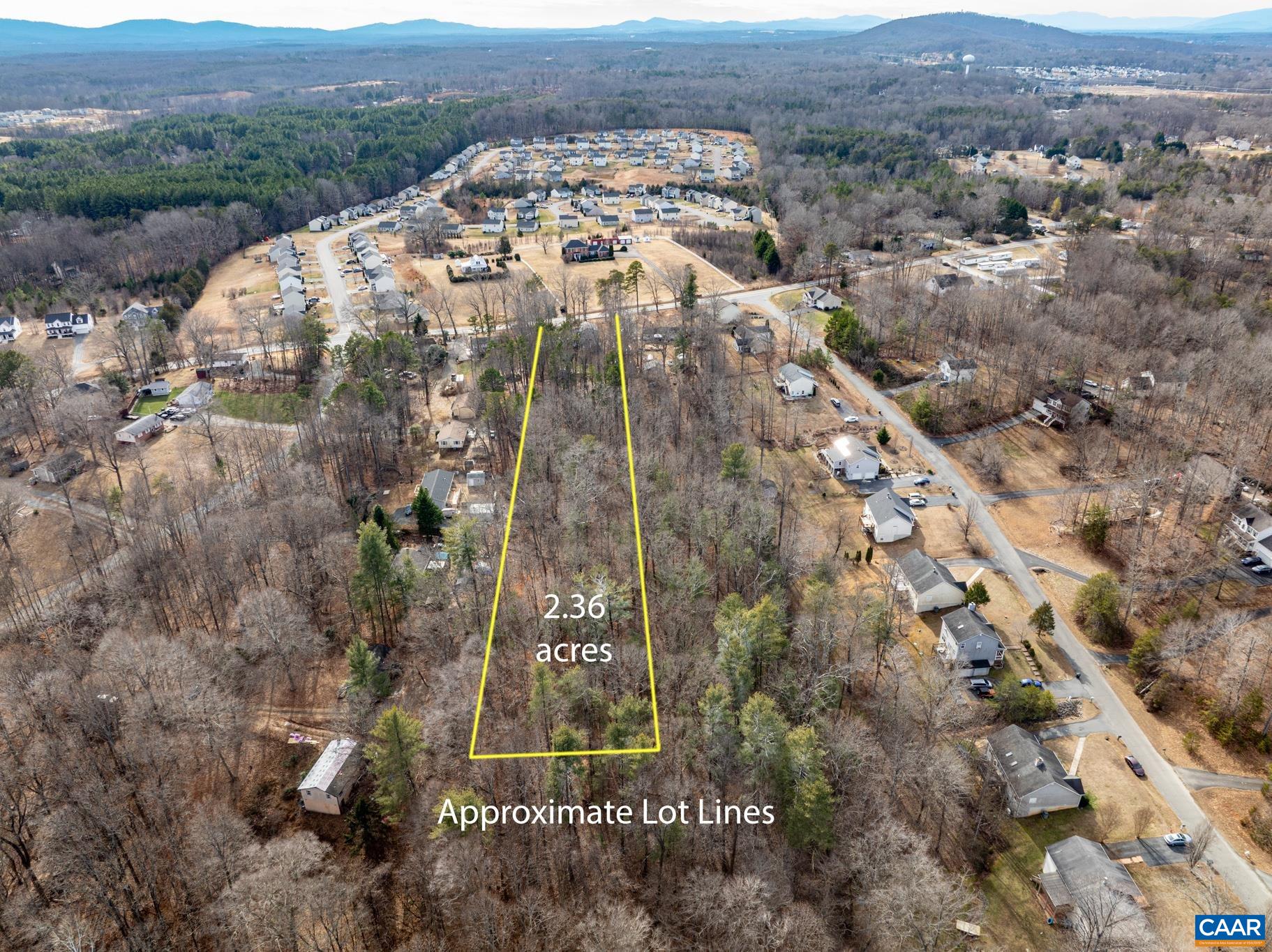 987 Matthew Mill Road Ruckersville, VA 22968 - Photo 56 of 63 an aerial view of a residential apartment building with a yard
