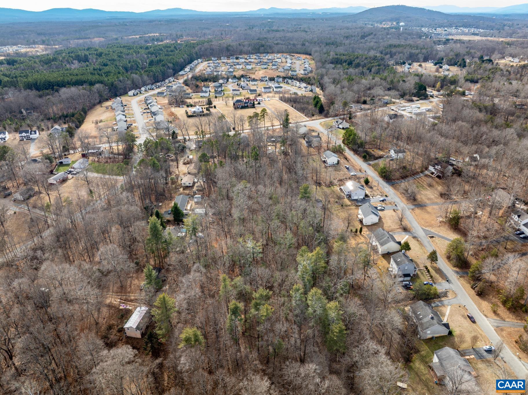 987 Matthew Mill Road Ruckersville, VA 22968 - Photo 60 of 63 an aerial view of a house with a yard