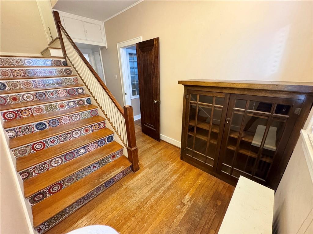 309 North 3rd Street Apollo, PA 15613 - Photo 21 of 43 Wide steps to upper level, hardwood floors and beautiful built-ins