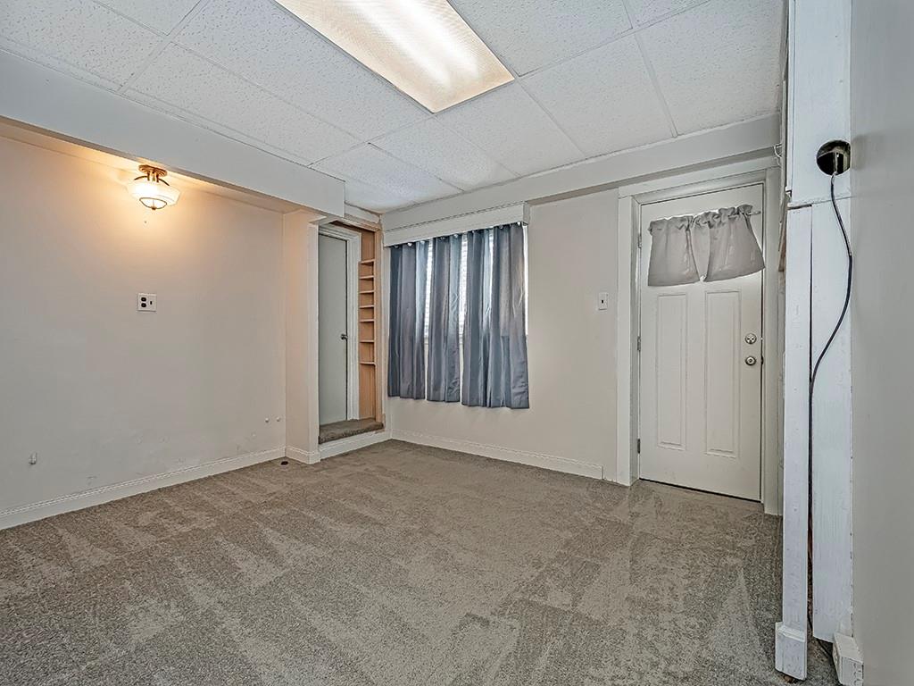 309 North 3rd Street Apollo, PA 15613 - Photo 32 of 43 Family room with access to garage and exterior of home