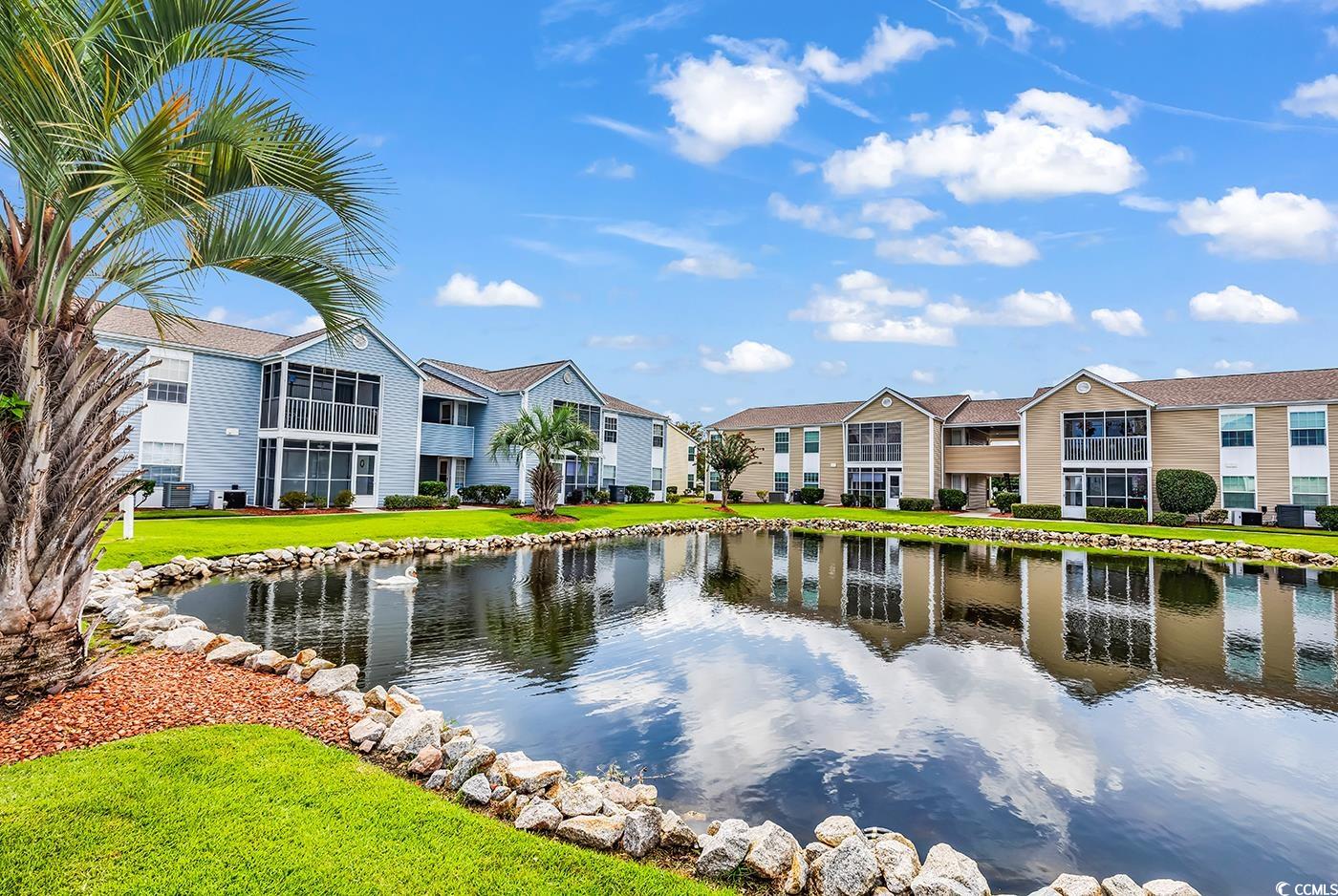 Water view with nearby suburban area