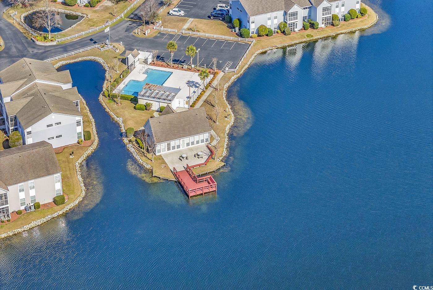 8796 Chandler Drive, Unit F Surfside Beach, SC 29575 - Photo 19 of 21 Aerial view of a nearby body of water