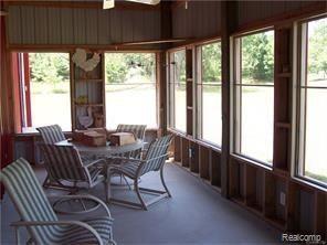 7990 Antcliff Road Howell, MI 48855 - Photo 48 of 51 Screened porch.