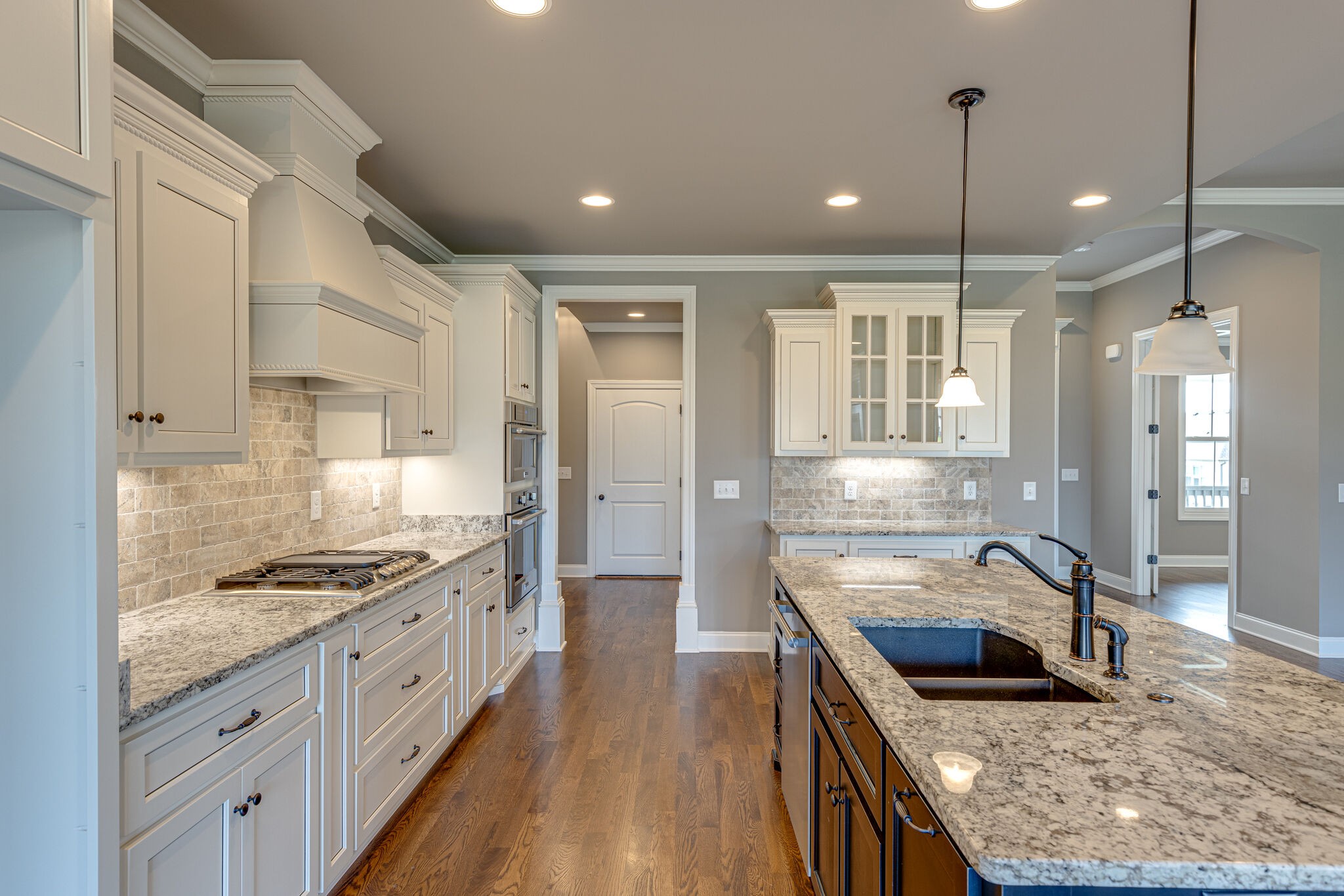 2040 Imagine Circle Spring Hill, TN 37174 - Photo 15 of 51 a kitchen with stainless steel appliances granite countertop sink stove and refrigerator
