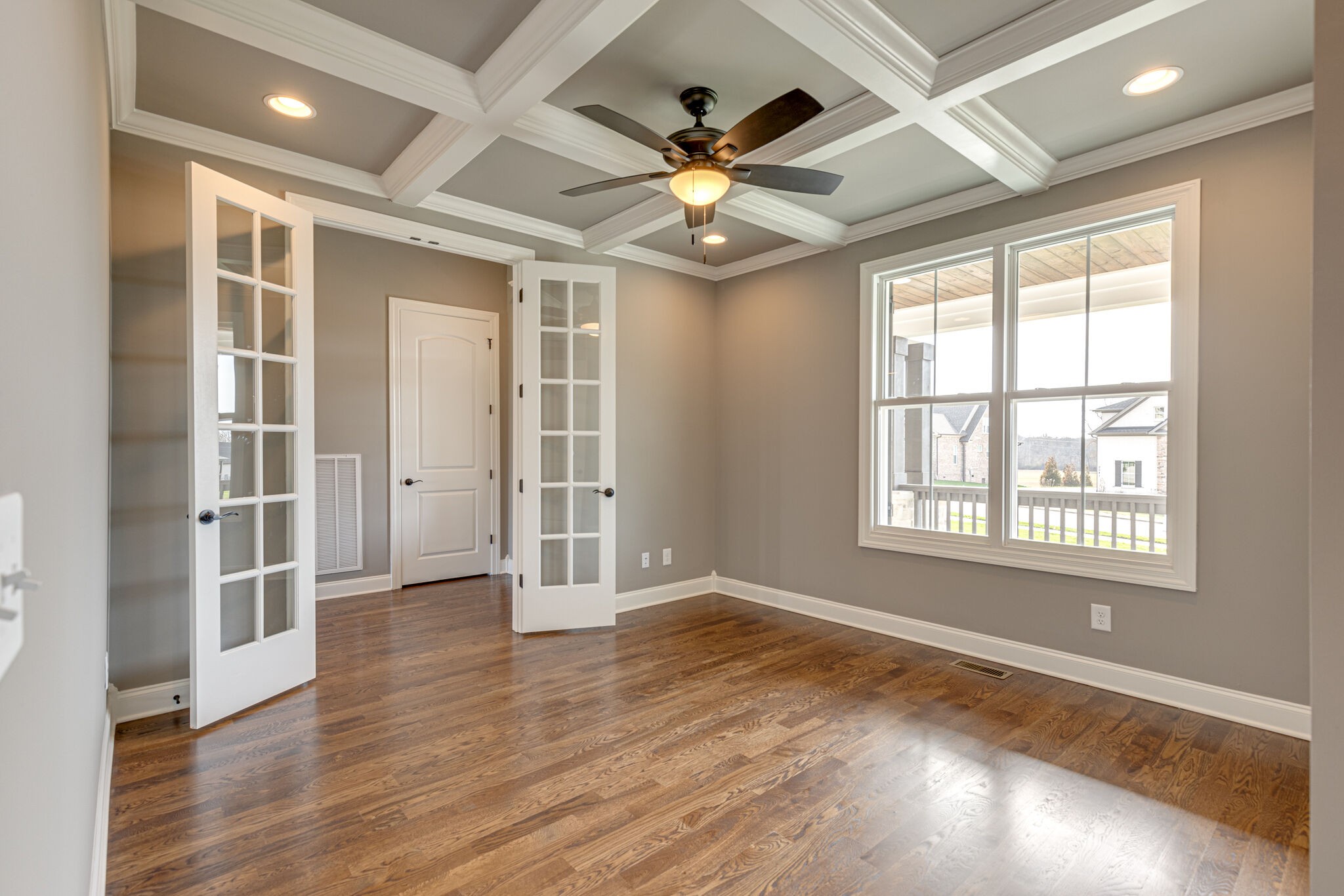 2040 Imagine Circle Spring Hill, TN 37174 - Photo 23 of 51 a view of an empty room with wooden floor and a window