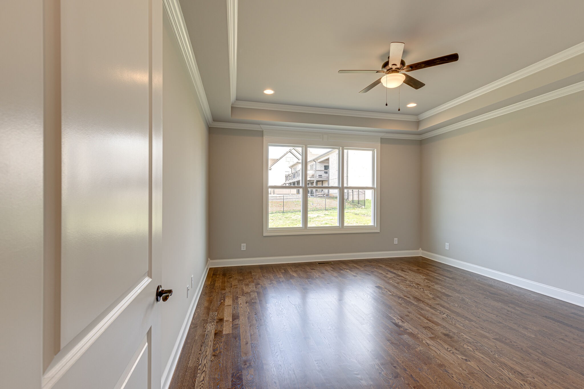 2040 Imagine Circle Spring Hill, TN 37174 - Photo 24 of 51 a view of an empty room with wooden floor and a window
