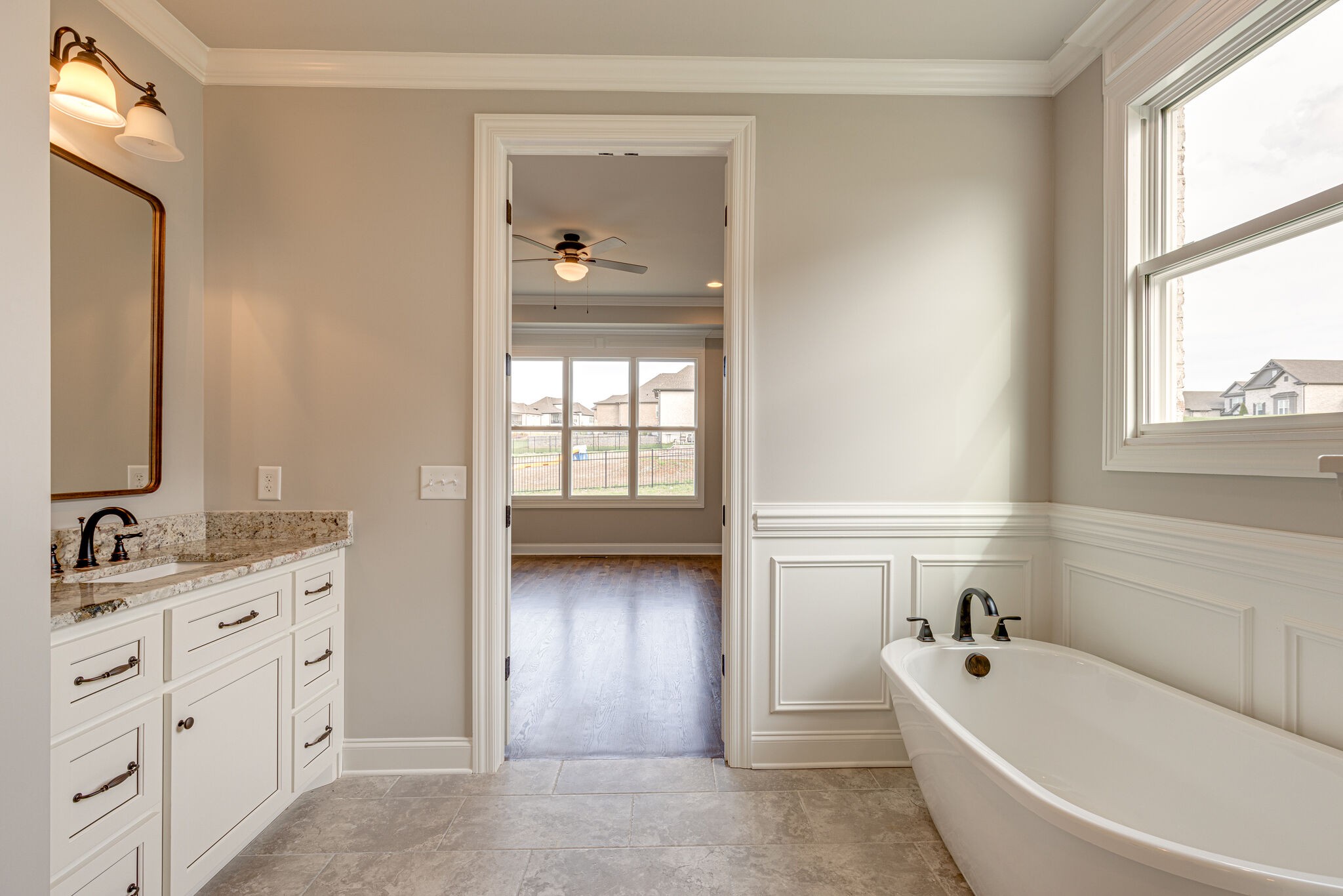 2040 Imagine Circle Spring Hill, TN 37174 - Photo 29 of 51 a bathroom with a bathtub sink and mirror