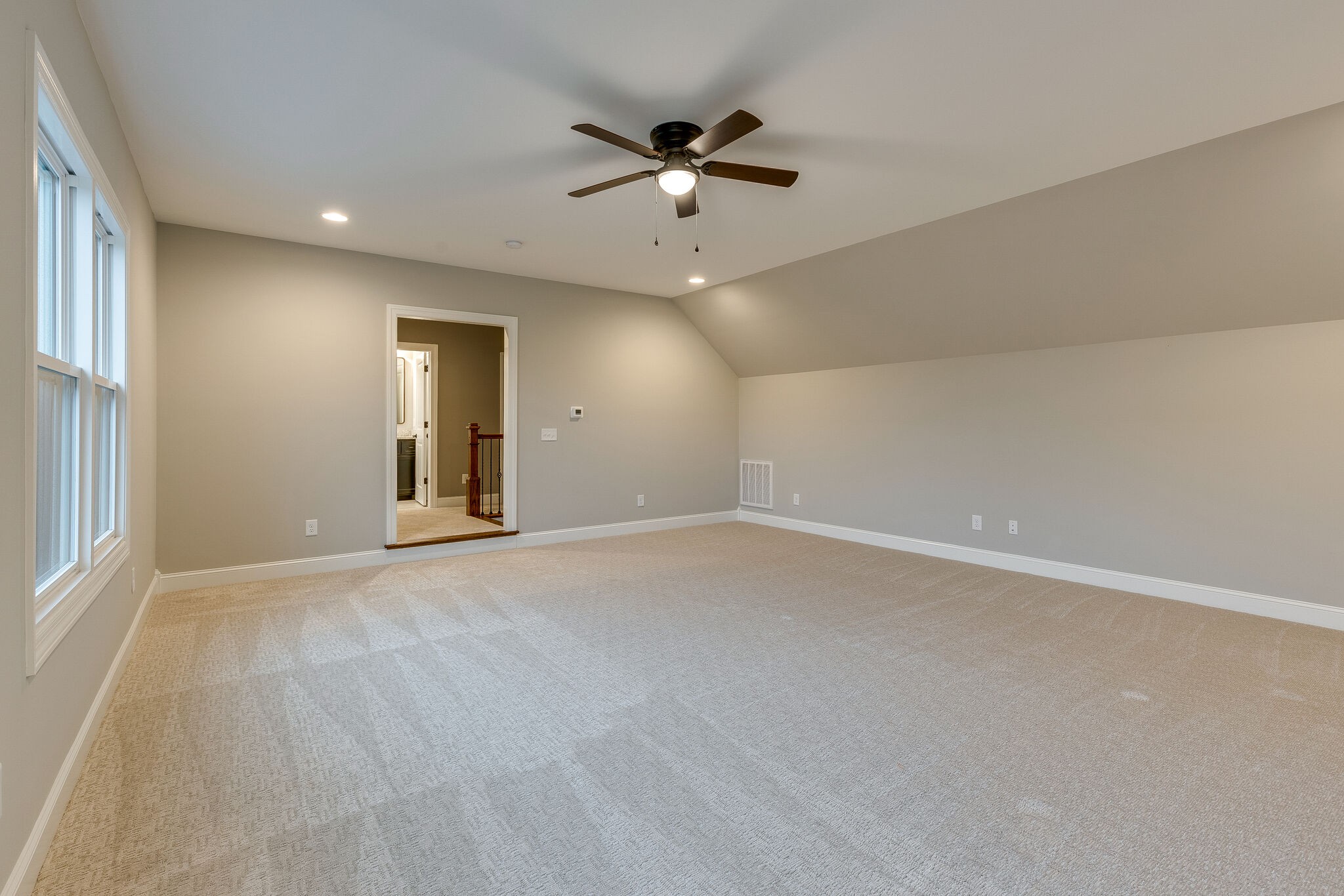 2040 Imagine Circle Spring Hill, TN 37174 - Photo 42 of 51 an empty room with ceiling fan and window
