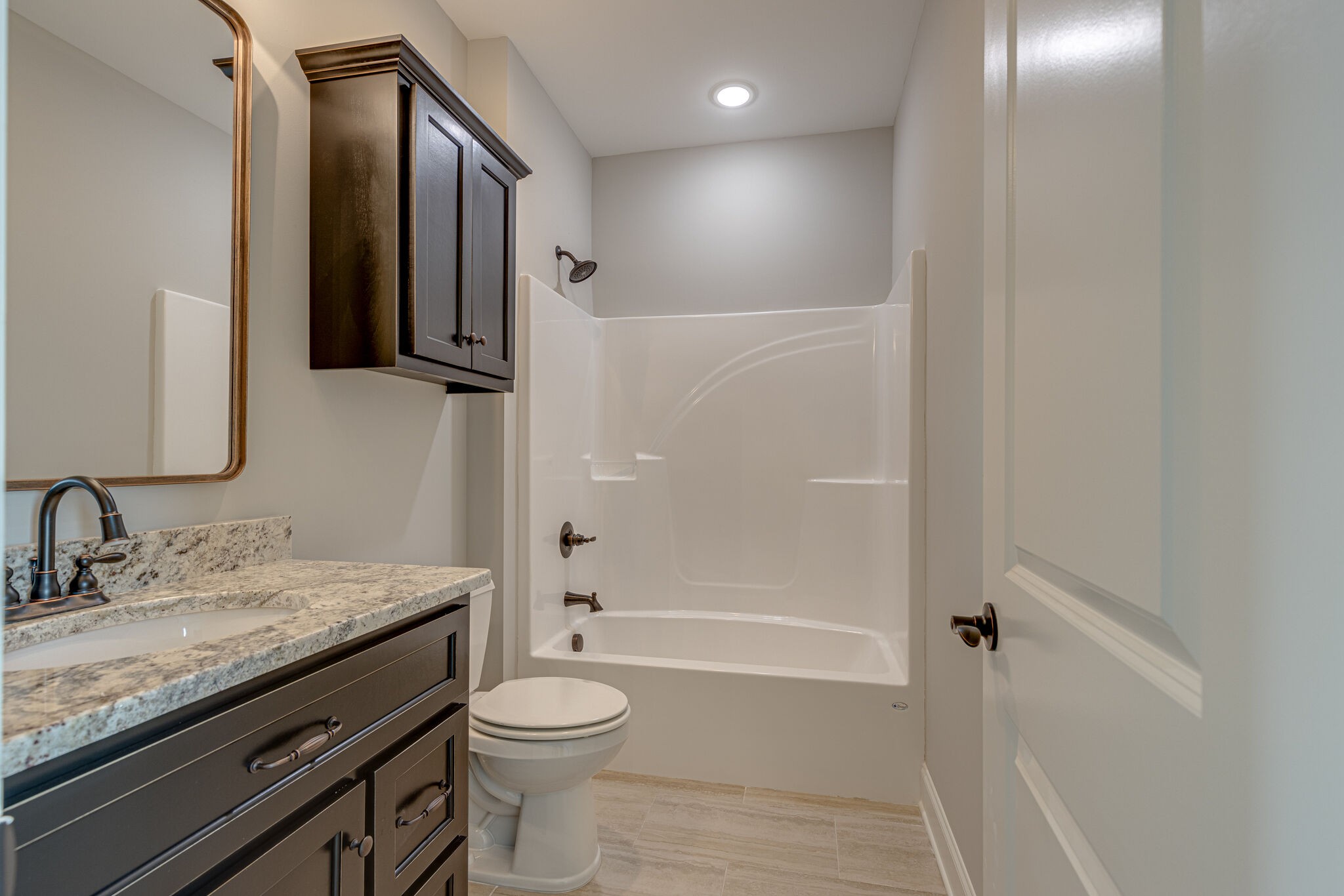 2040 Imagine Circle Spring Hill, TN 37174 - Photo 43 of 51 a bathroom with a granite countertop sink toilet and shower