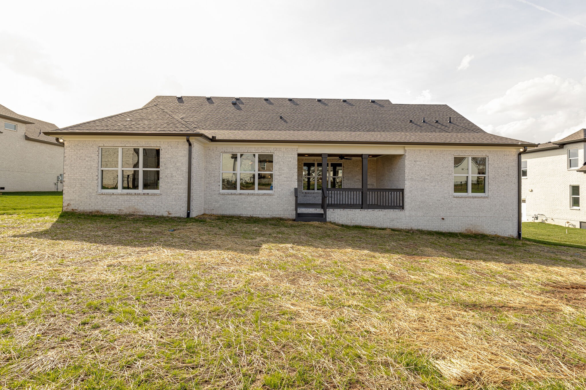 2040 Imagine Circle Spring Hill, TN 37174 - Photo 49 of 51 a view of a house with a backyard