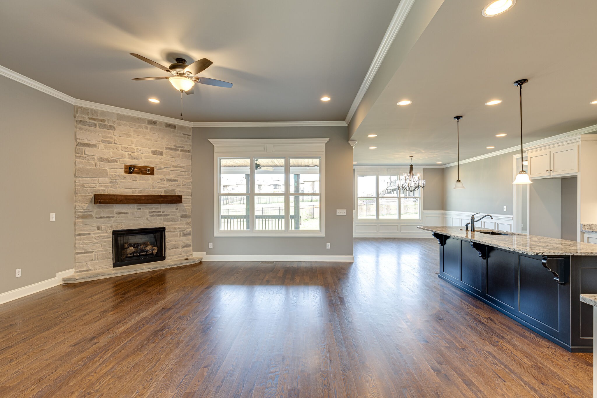 2040 Imagine Circle Spring Hill, TN 37174 - Photo 8 of 51 a view of a livingroom with furniture wooden floor fireplace and a window