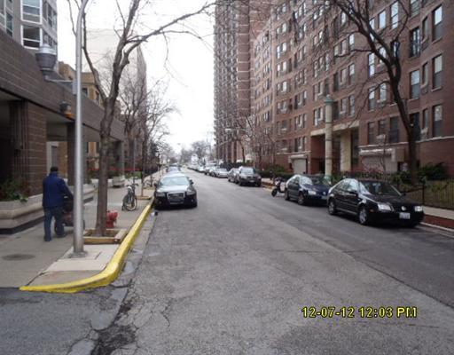 720 West Gordon Terrace, Unit 15L Chicago, IL 60613 - Photo 8 of 12 a view of a street with cars