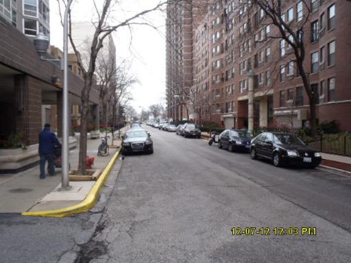 720 West Gordon Terrace, Unit 15L Chicago, IL 60613 - Photo 10 of 12 a view of a street with cars