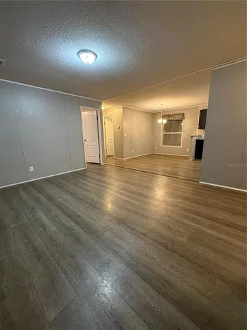 a view of a kitchen with a sink