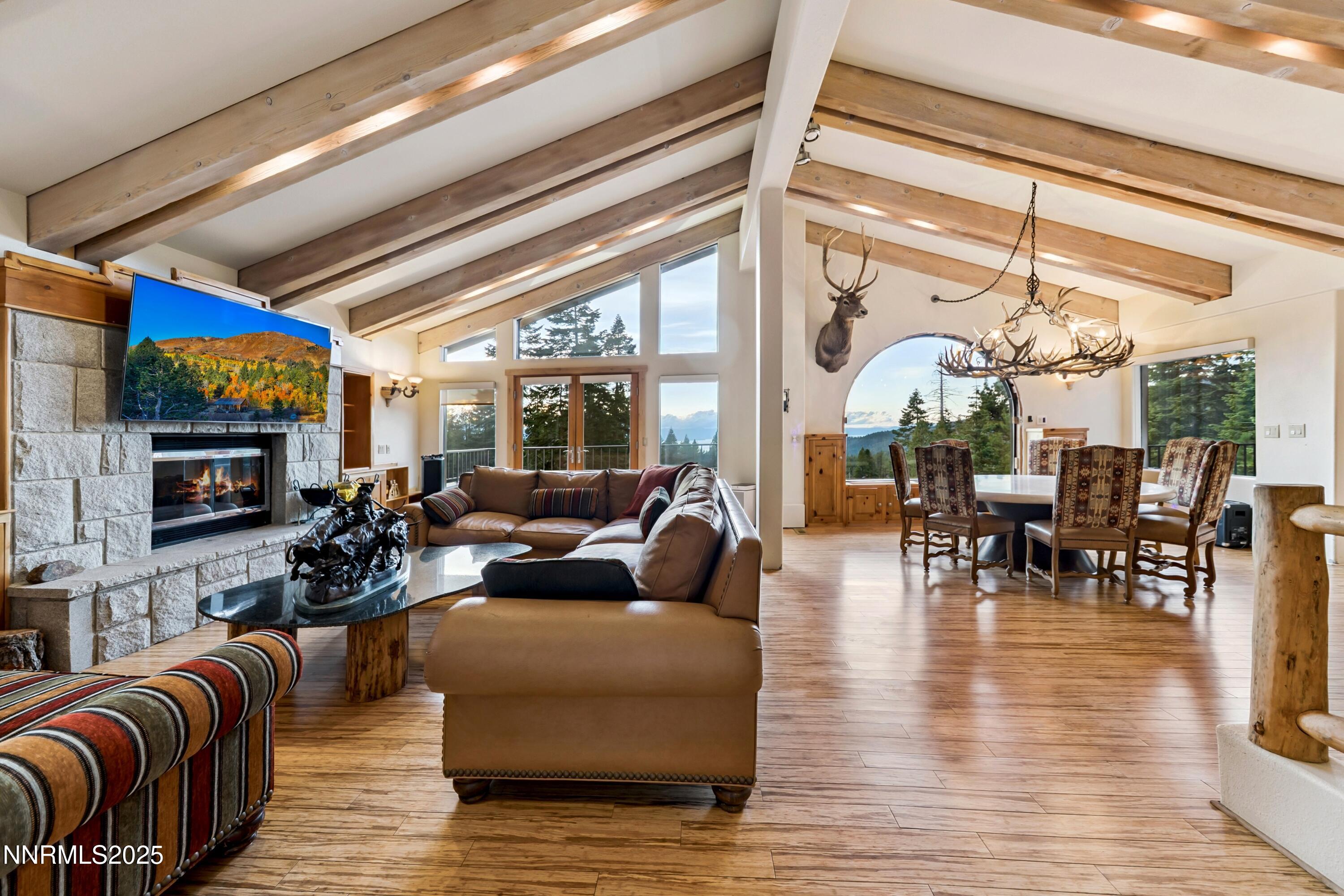 130 Granite Crest Drive Stateline, NV 89449 - Photo 12 of 85 a living room with fireplace furniture and a flat screen tv
