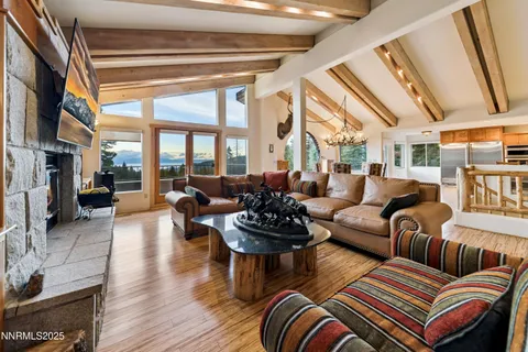 a view of a balcony with wooden fence and floor