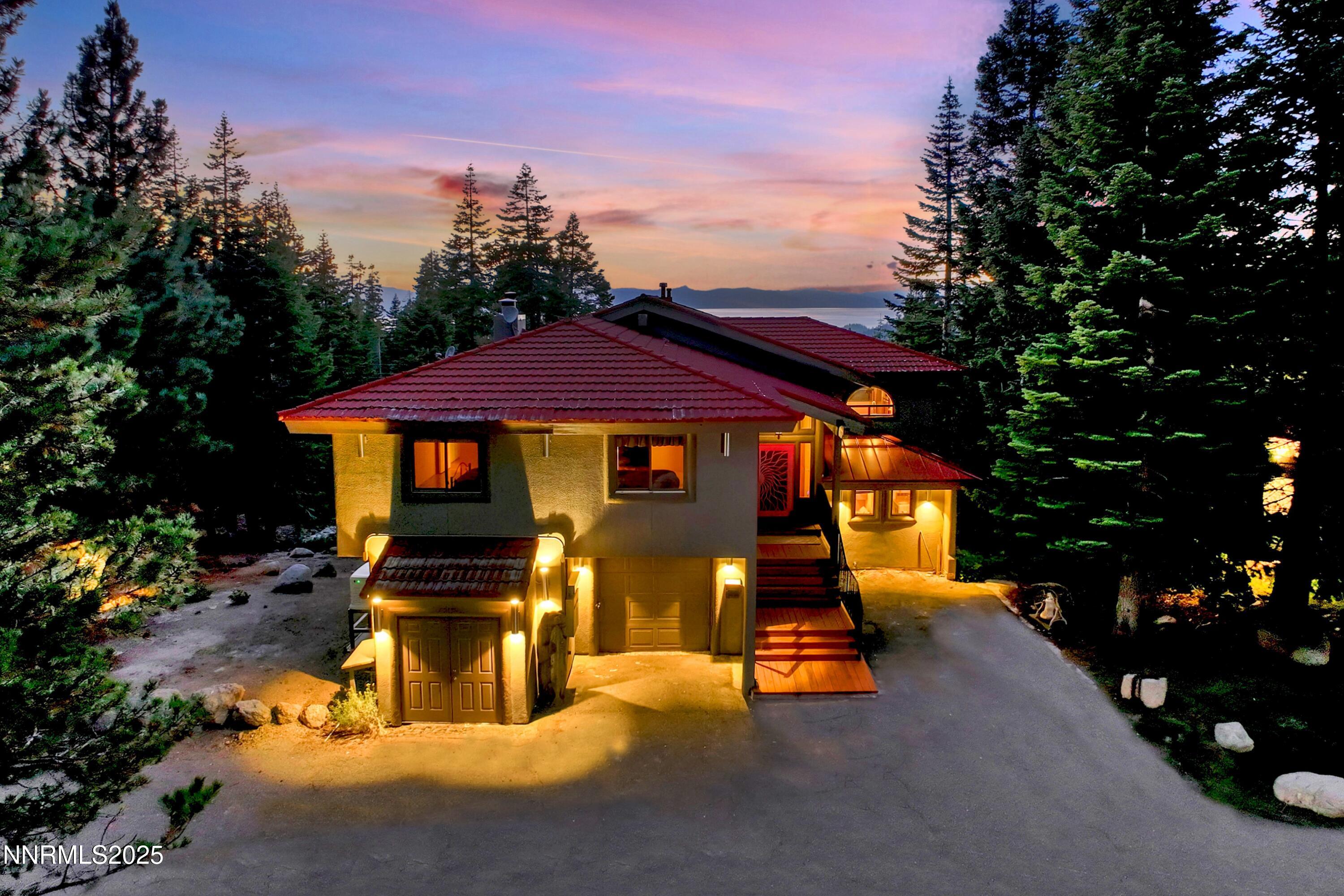 130 Granite Crest Drive Stateline, NV 89449 - Photo 2 of 85 a front view of a house with a yard