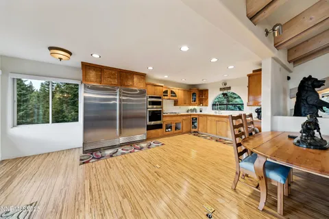 a spacious bedroom with a bed and window