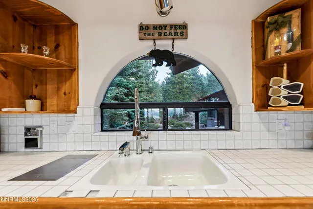 a bathroom with a shower and a sink