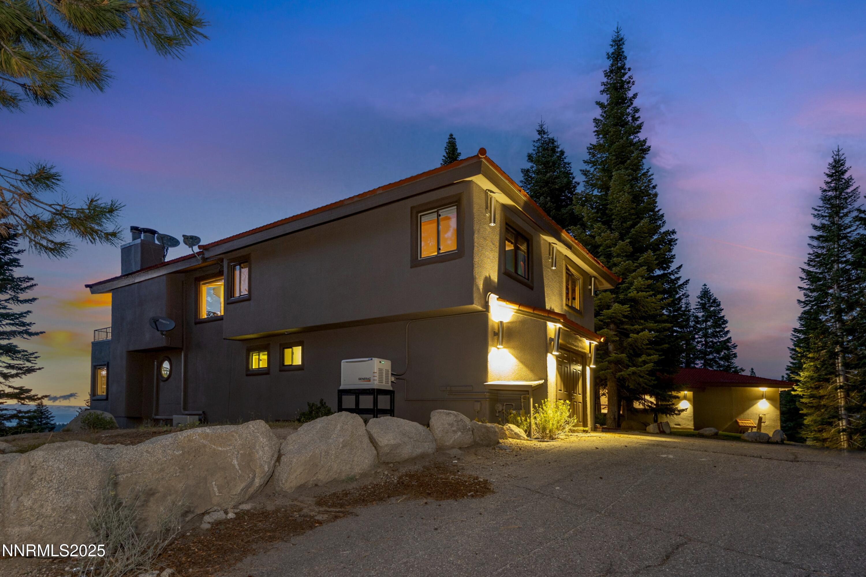 130 Granite Crest Drive Stateline, NV 89449 - Photo 7 of 85 a front view of a house with a yard