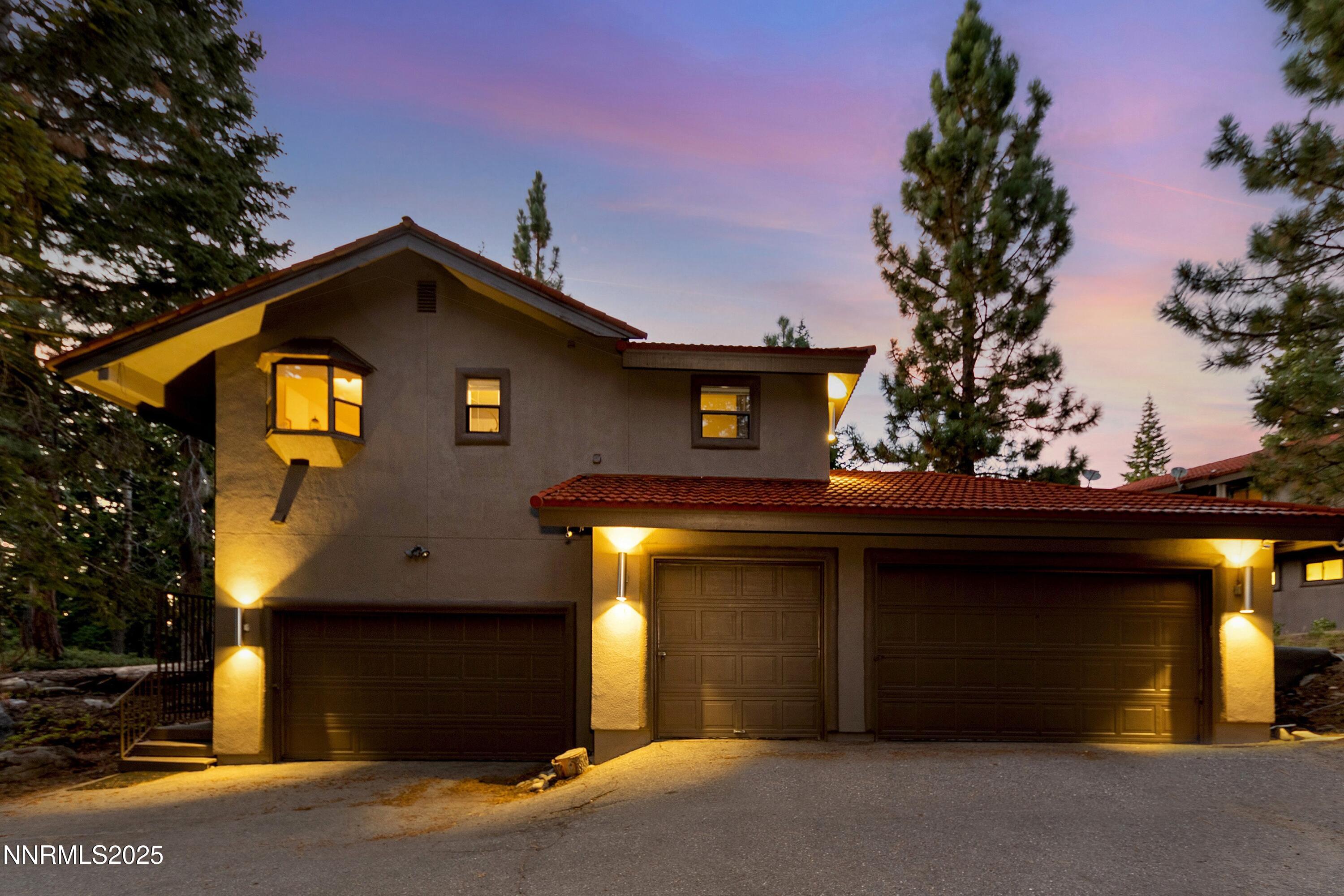 130 Granite Crest Drive Stateline, NV 89449 - Photo 78 of 85 a front view of a house with a yard