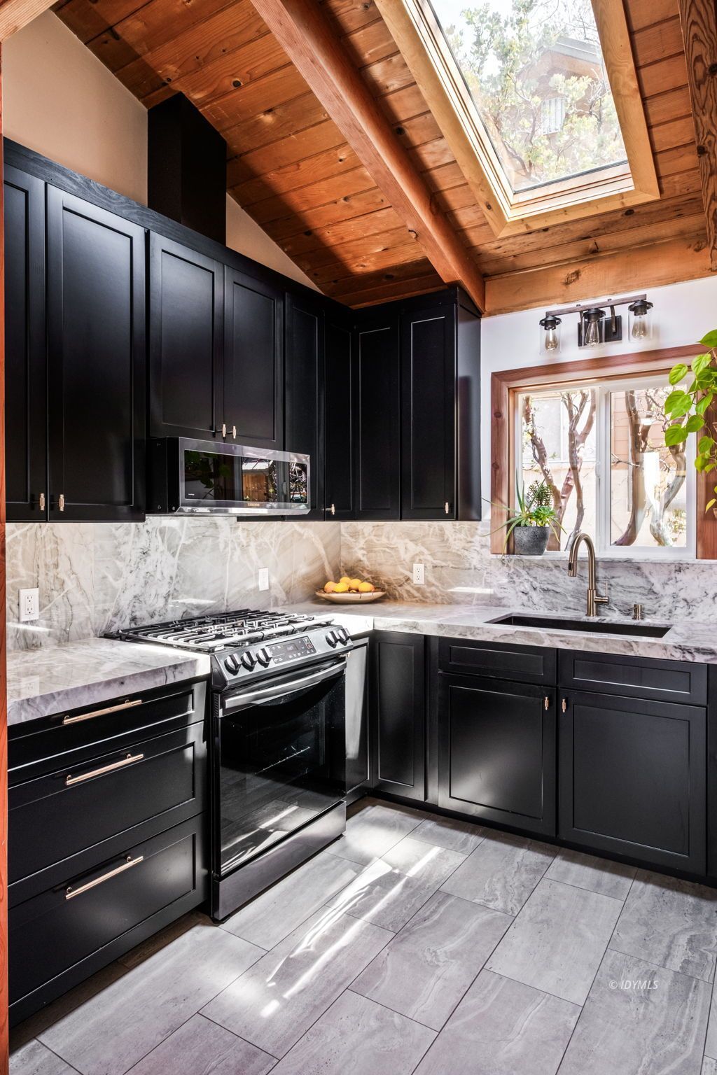 24750 Marion Ridge Drive Idyllwild, CA 92549 - Photo 23 of 45 a kitchen with stainless steel appliances granite countertop a stove and a sink