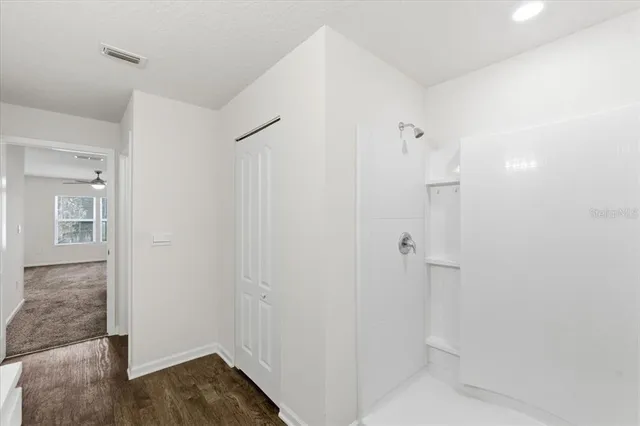 a bathroom with a sink toilet and a bathtub