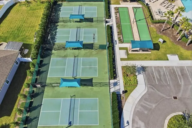 an aerial view of a house with a garden