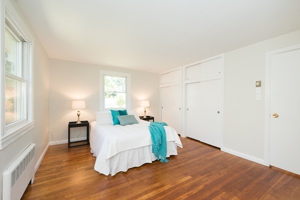 14 Russell Road Lexington, MA 02420 - Photo 11 of 20 a living room with furniture and wooden floor