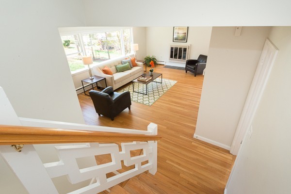 14 Russell Road Lexington, MA 02420 - Photo 13 of 20 a living room with furniture and a table