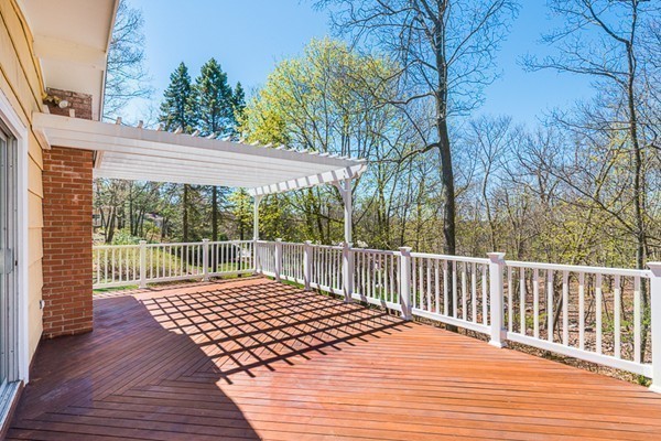 14 Russell Road Lexington, MA 02420 - Photo 17 of 20 a balcony view with wooden floor and fence