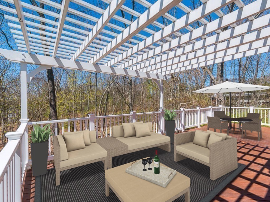 14 Russell Road Lexington, MA 02420 - Photo 18 of 20 a roof deck with couches and potted plants
