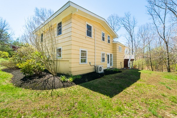 14 Russell Road Lexington, MA 02420 - Photo 19 of 20 a view of a house with backyard and garden