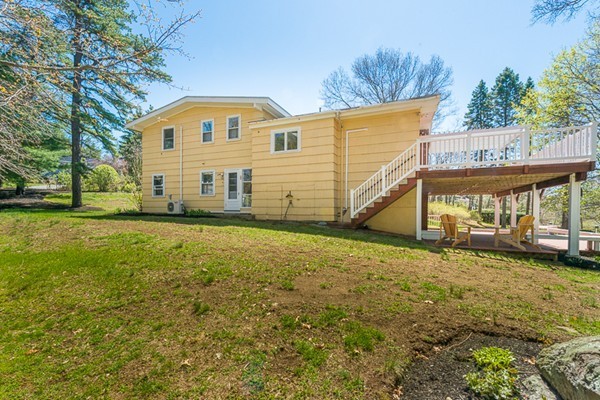 14 Russell Road Lexington, MA 02420 - Photo 20 of 20 a view of a house with a yard