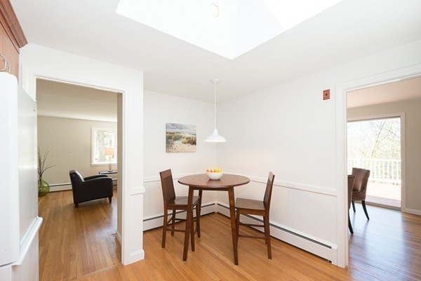14 Russell Road Lexington, MA 02420 - Photo 7 of 20 a view of a dining room with furniture and wooden floor