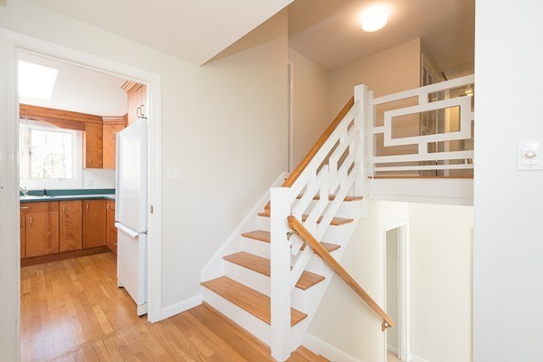 14 Russell Road Lexington, MA 02420 - Photo 9 of 20 a view of entryway with wooden floor and stairs