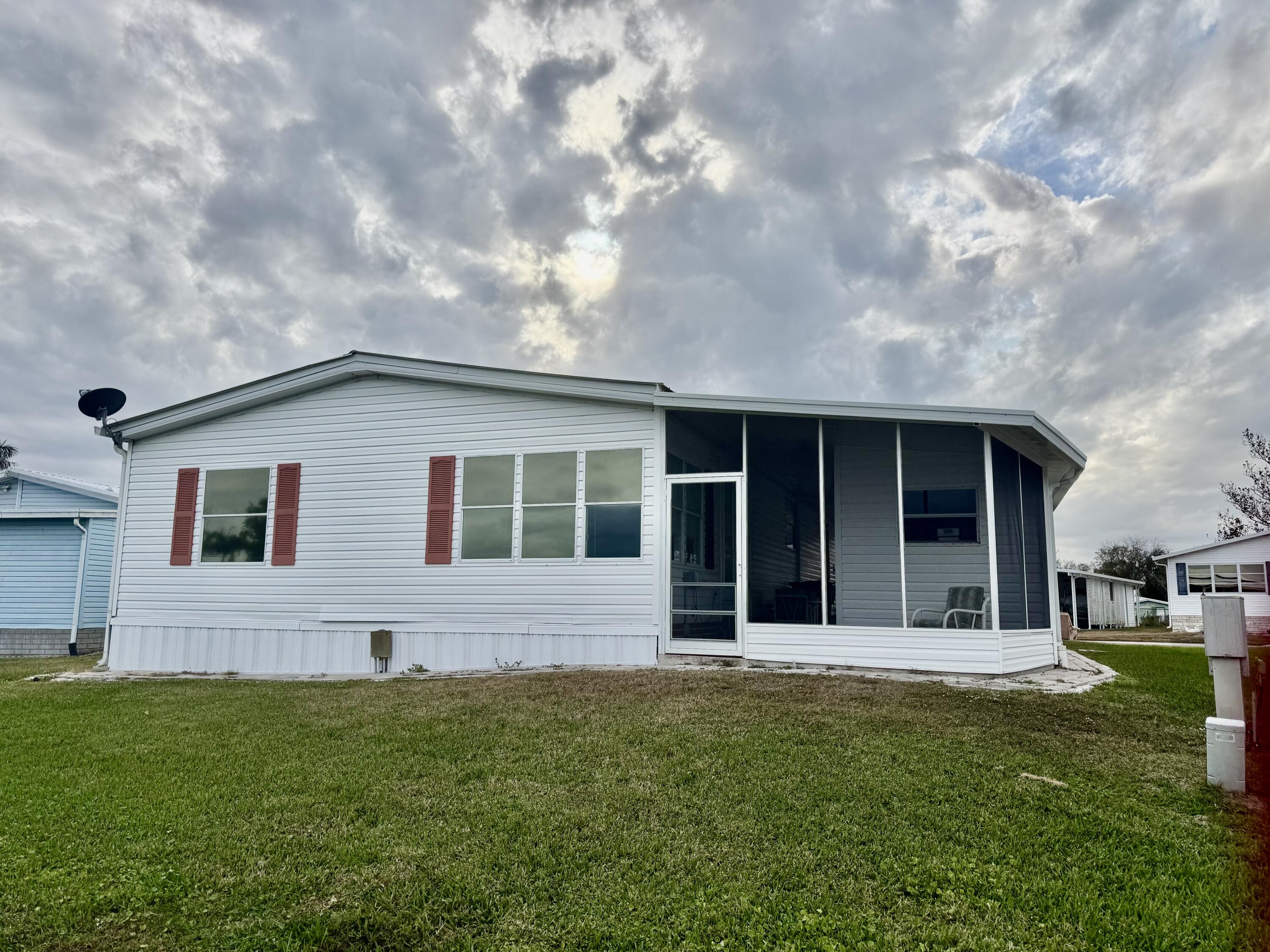 1704 Southwest 35th Circle Okeechobee, FL 34974 - Photo 34 of 44 a view of a house with backyard